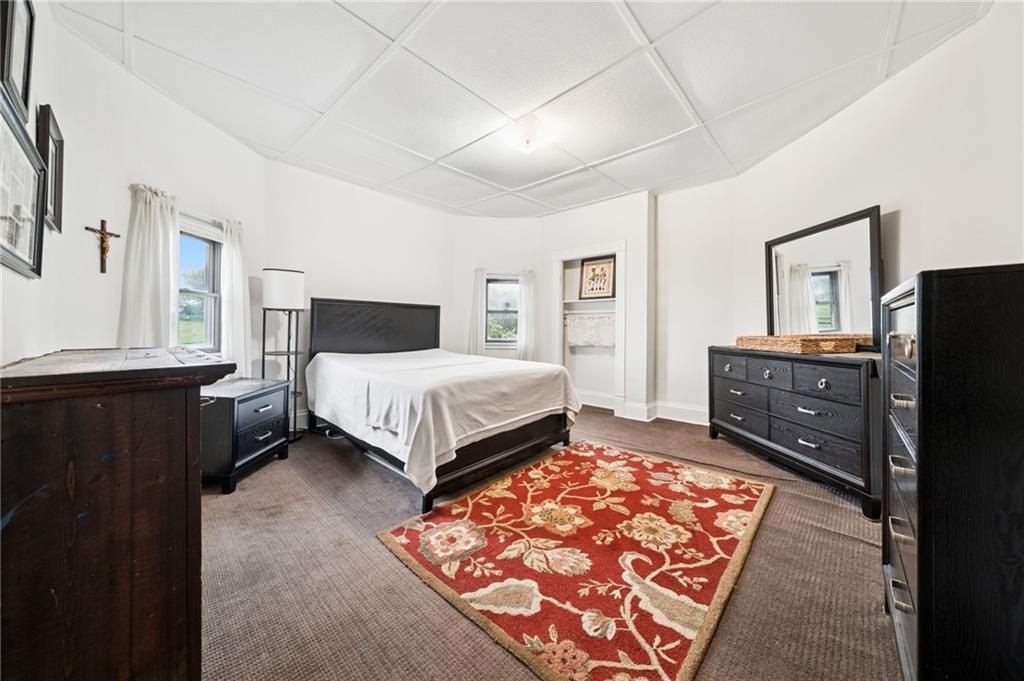 1035 Linden Road Eighty Four, PA 15330 - Photo 23 of 29 a bedroom with a bed and wooden floor