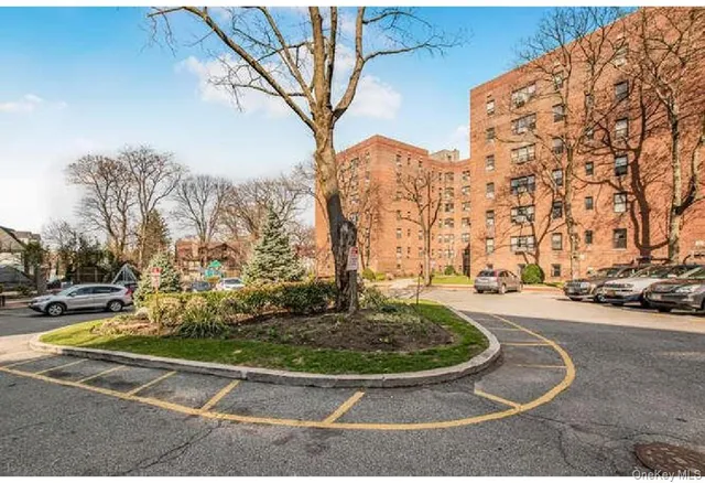 a view of a playground with basketball court