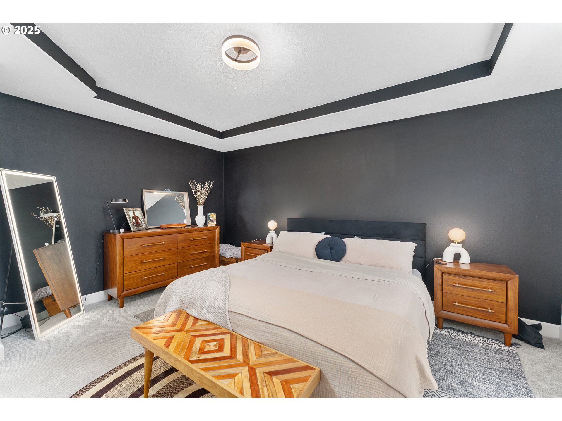 2264 Equestrian Loop South Salem, OR 97302 - Photo 18 of 34 a bedroom with a bed and a flat tv screen on dresser