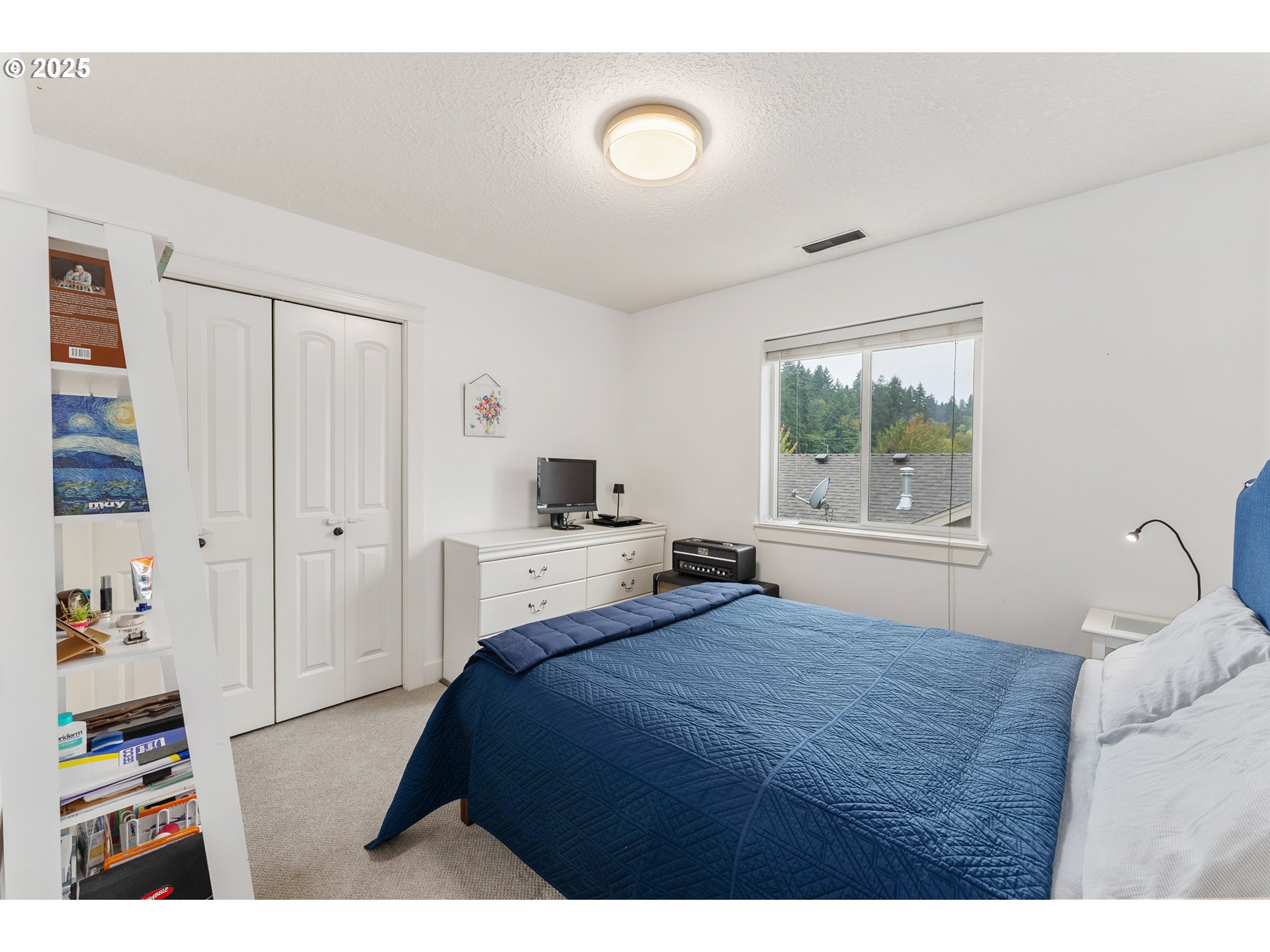 2264 Equestrian Loop South Salem, OR 97302 - Photo 26 of 34 a bedroom with a bed and a window
