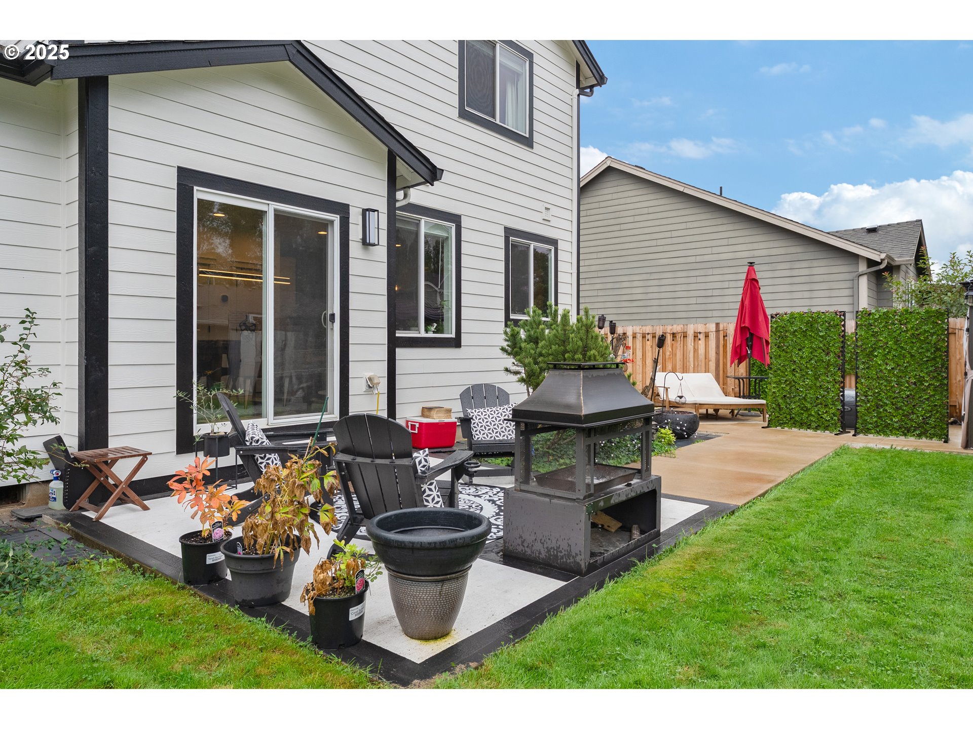 2264 Equestrian Loop South Salem, OR 97302 - Photo 28 of 34 a view of a house with backyard and sitting area