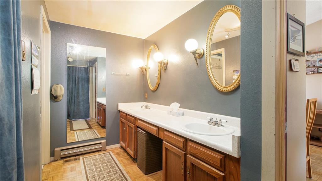 151 Alpine Road Dillon, CO 80435 - Photo 13 of 30 a bathroom with a sink and a mirror