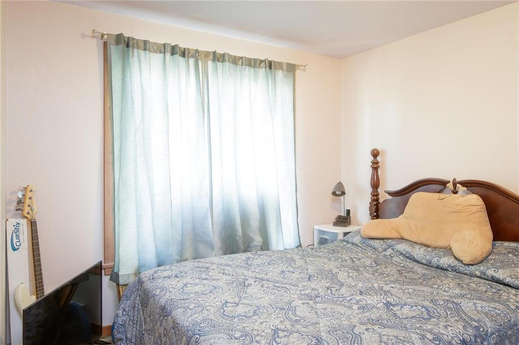 151 Alpine Road Dillon, CO 80435 - Photo 15 of 30 a bedroom with a bed and a window