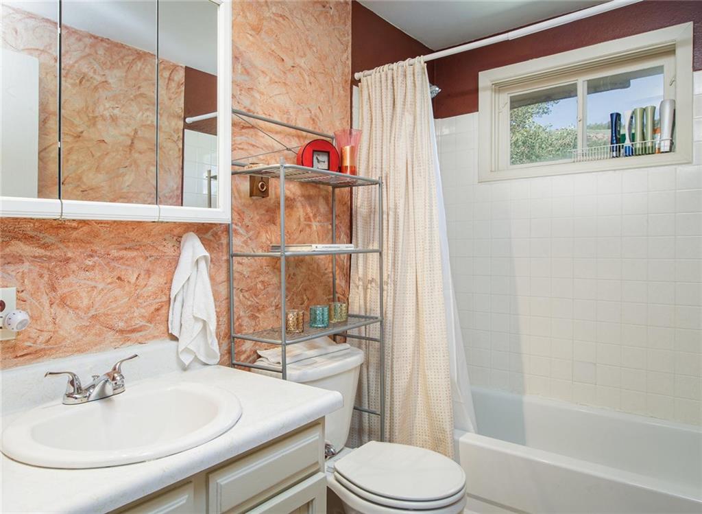 151 Alpine Road Dillon, CO 80435 - Photo 16 of 30 a bathroom with a sink and a mirror