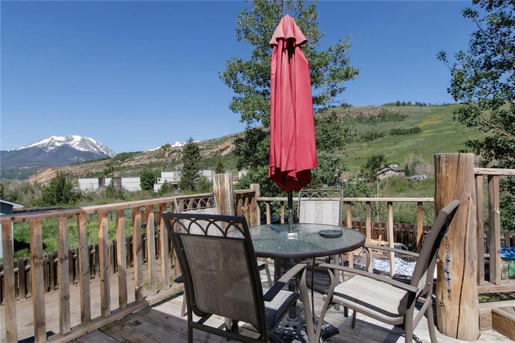 151 Alpine Road Dillon, CO 80435 - Photo 17 of 30 a view of a chairs and table in patio