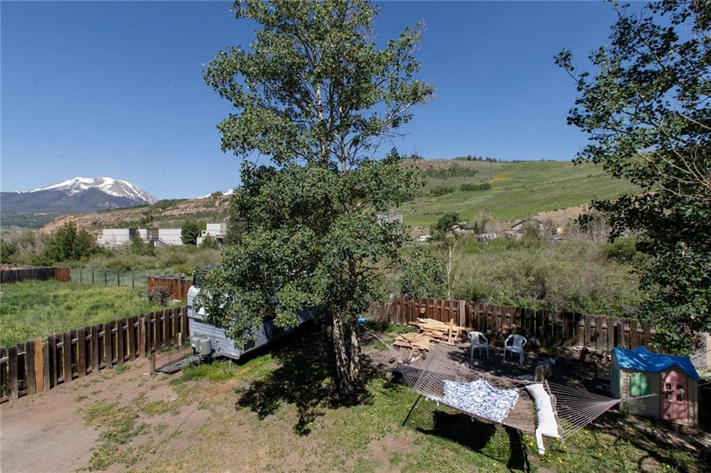 151 Alpine Road Dillon, CO 80435 - Photo 18 of 30 a view of a yard with wooden fence