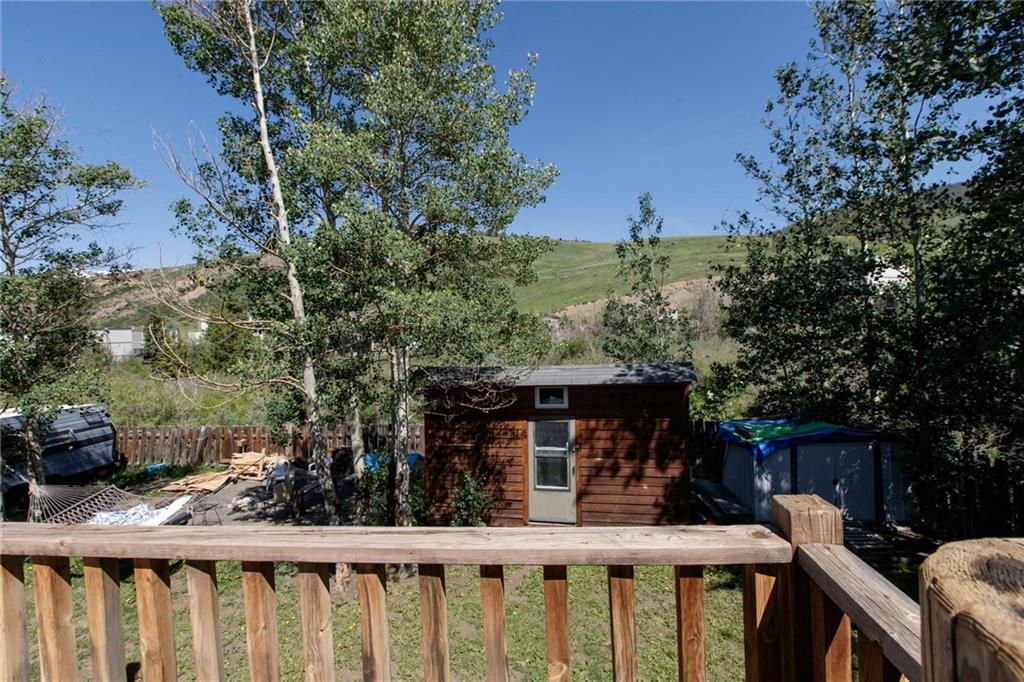 151 Alpine Road Dillon, CO 80435 - Photo 21 of 30 a view of a house with a yard