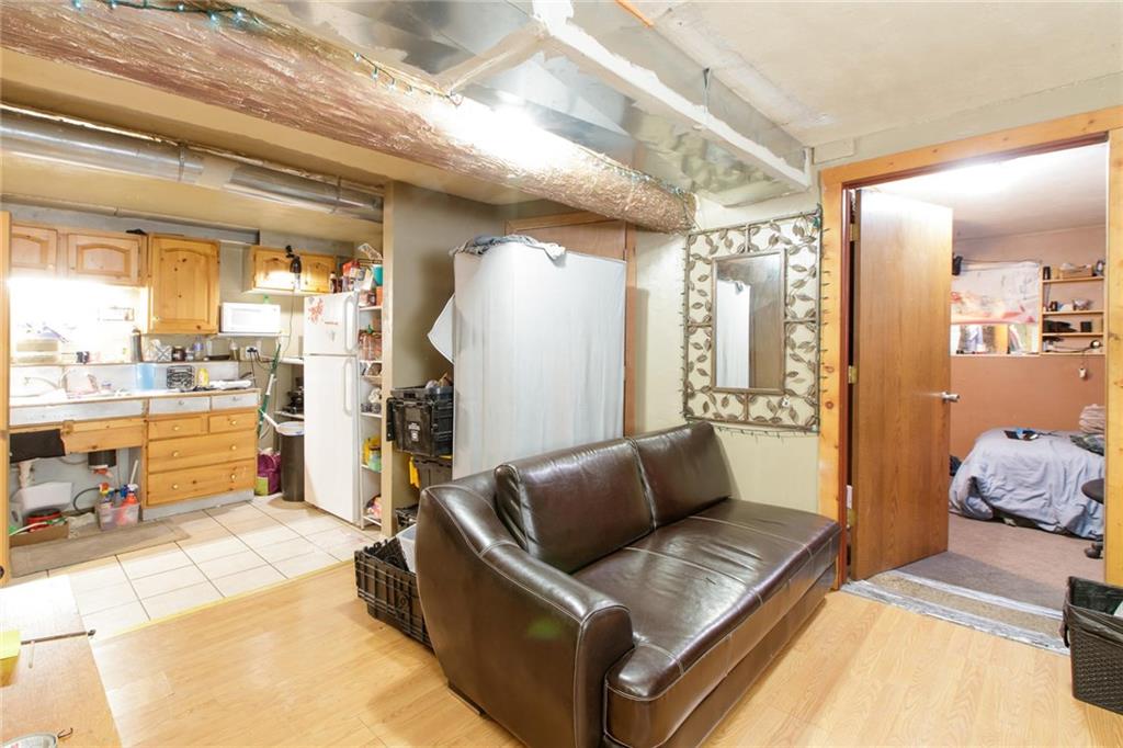 151 Alpine Road Dillon, CO 80435 - Photo 25 of 30 a living room with furniture and a table