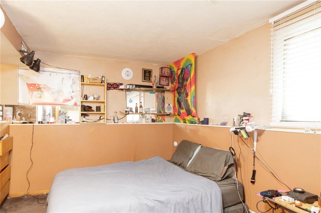151 Alpine Road Dillon, CO 80435 - Photo 28 of 30 a bed sitting in a room next to a window