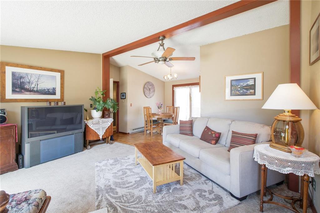 151 Alpine Road Dillon, CO 80435 - Photo 6 of 30 a living room with furniture a rug and a lamp