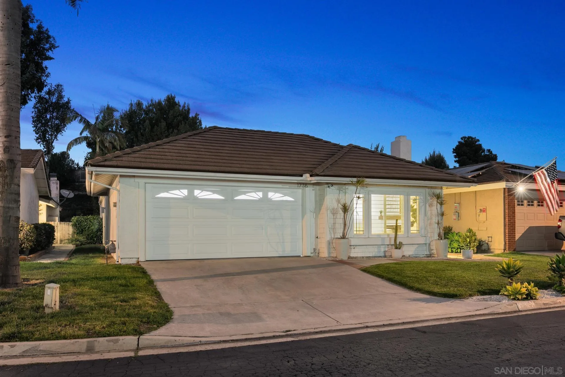1736 Hill Top Lane Encinitas, CA 92024 - Photo 1 of 63 a front view of a house with a yard