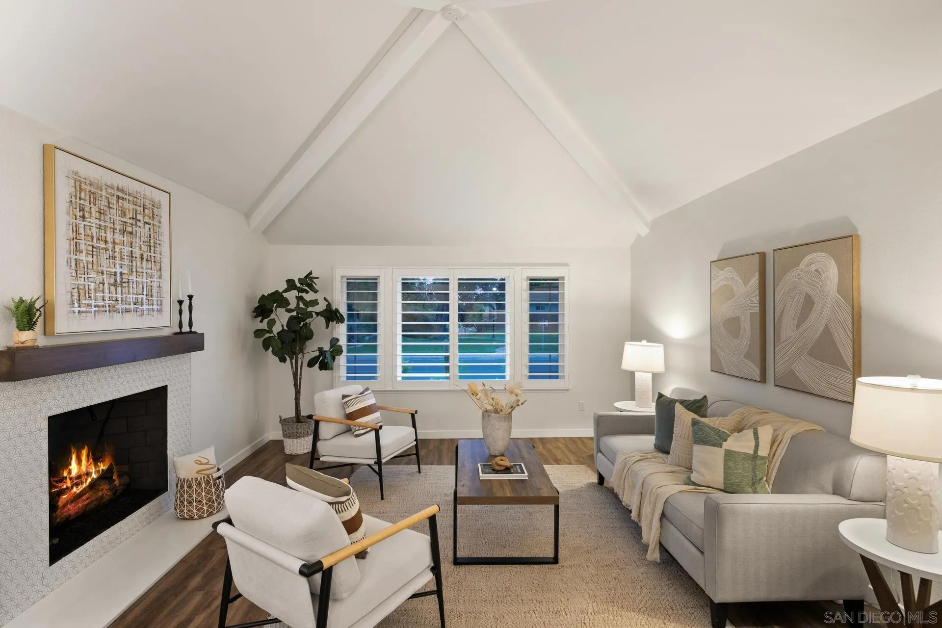 1736 Hill Top Lane Encinitas, CA 92024 - Photo 11 of 63 a living room with furniture and a fireplace