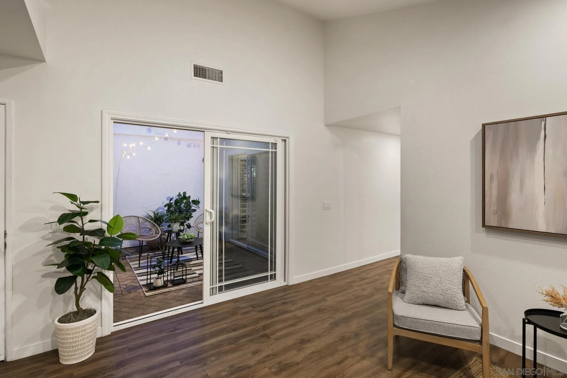 1736 Hill Top Lane Encinitas, CA 92024 - Photo 15 of 63 a living room with furniture and potted plant