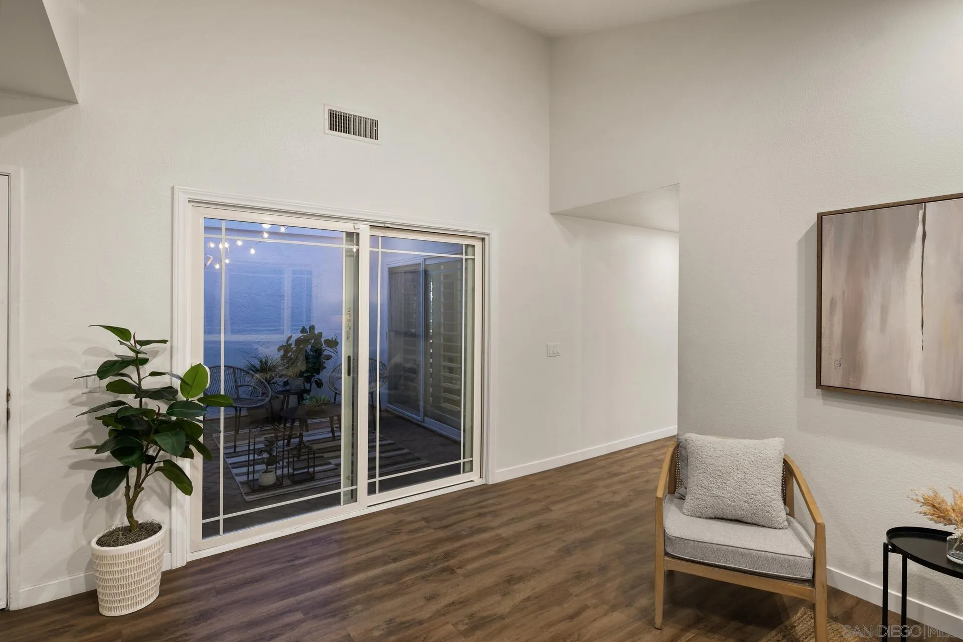 1736 Hill Top Lane Encinitas, CA 92024 - Photo 16 of 63 a living room with furniture and a potted plant