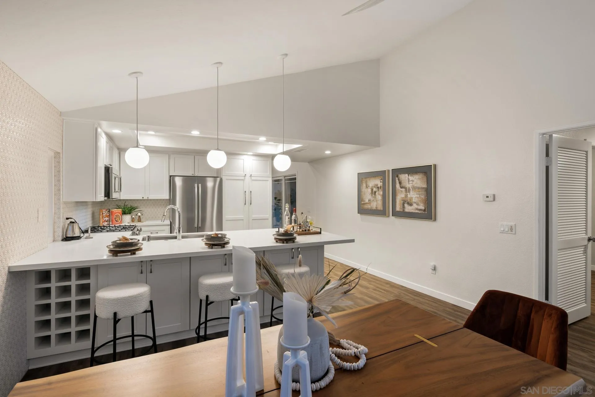 1736 Hill Top Lane Encinitas, CA 92024 - Photo 21 of 63 a view of a kitchen and dining room