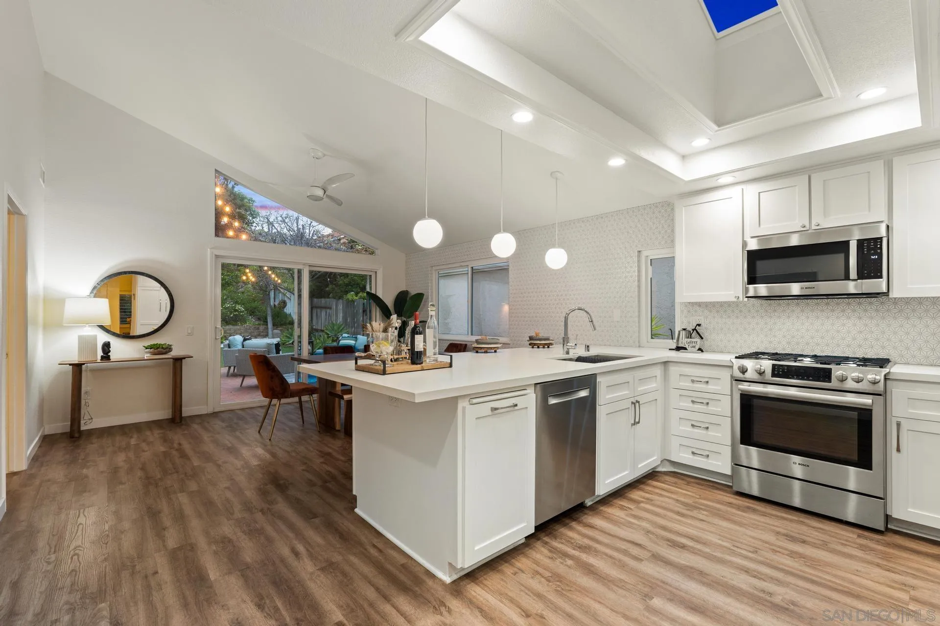 1736 Hill Top Lane Encinitas, CA 92024 - Photo 24 of 63 a kitchen with sink stove and refrigerator