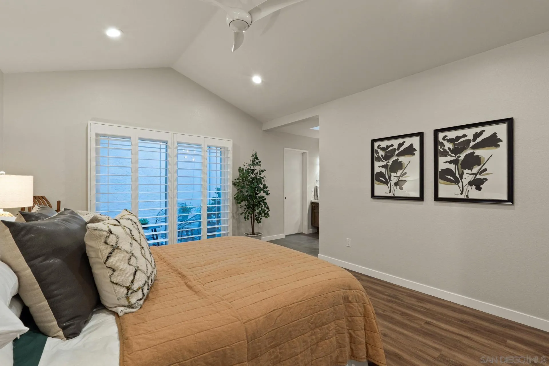 1736 Hill Top Lane Encinitas, CA 92024 - Photo 29 of 63 a bedroom with a large bed and a large window