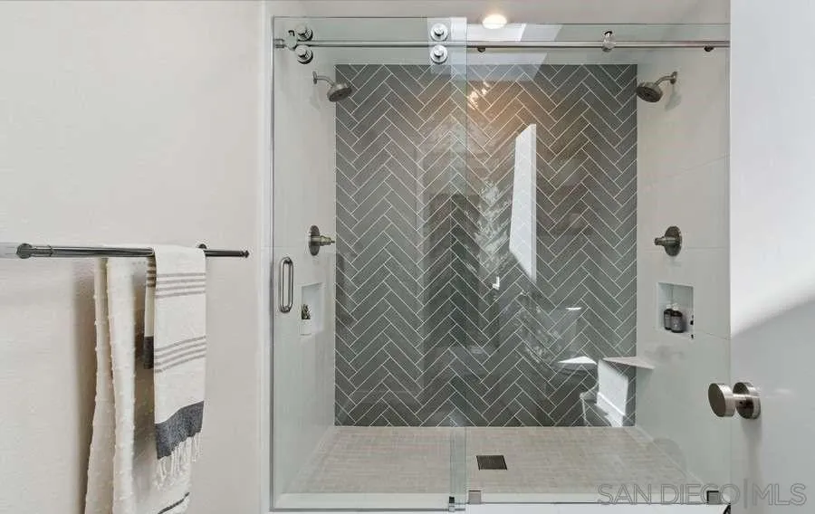 1736 Hill Top Lane Encinitas, CA 92024 - Photo 36 of 63 a bathroom with a shower and a tub