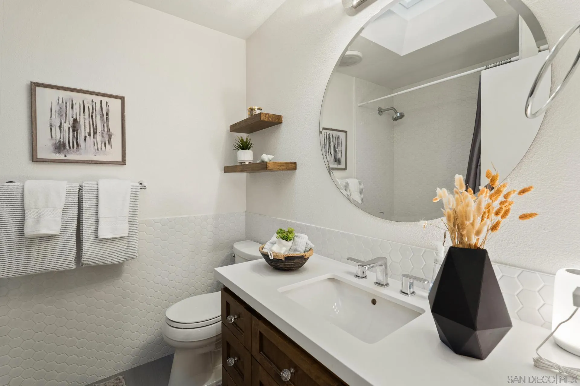 1736 Hill Top Lane Encinitas, CA 92024 - Photo 41 of 63 a bathroom with a sink toilet and shower