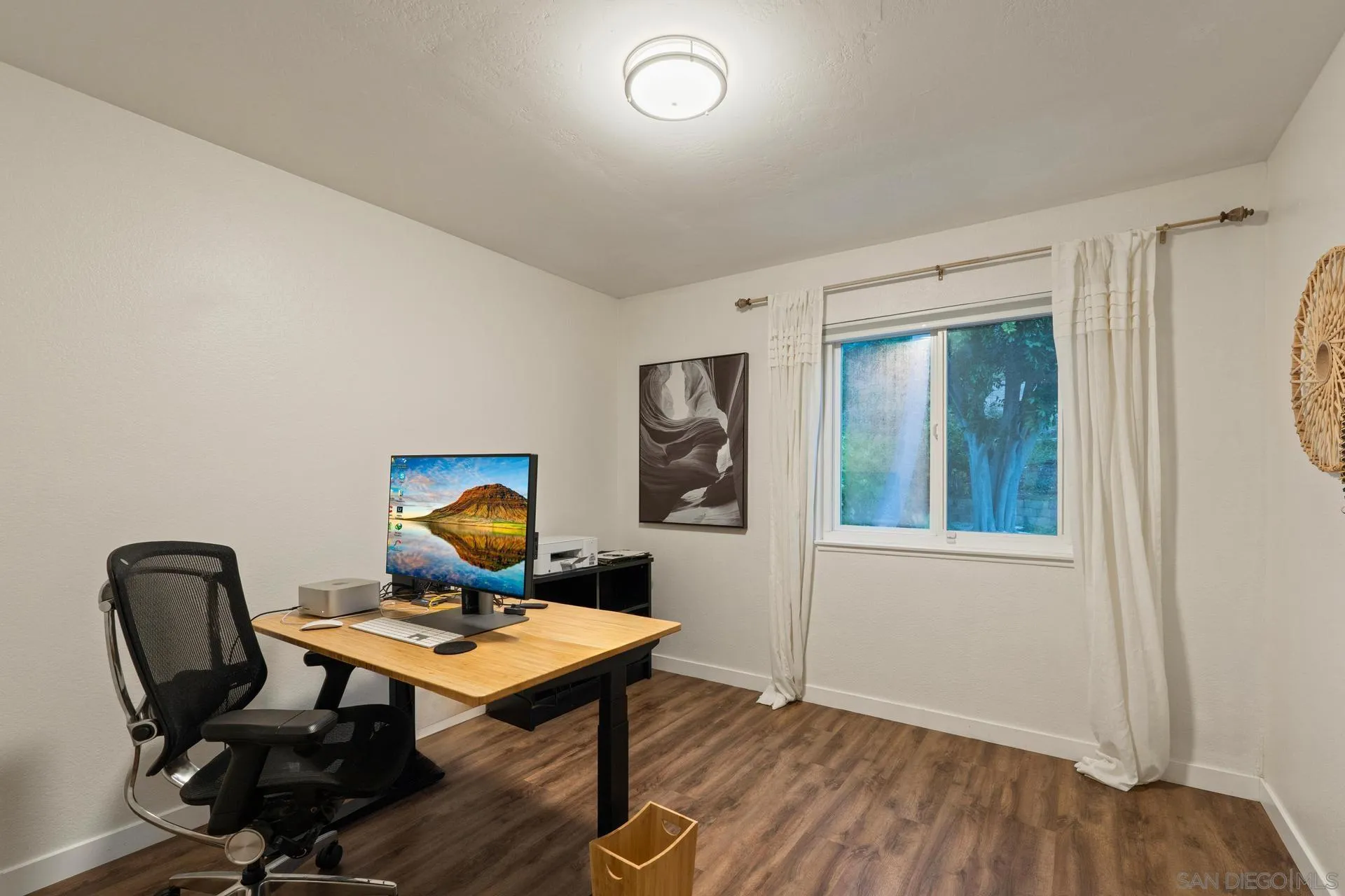 1736 Hill Top Lane Encinitas, CA 92024 - Photo 43 of 63 a workspace with furniture and wooden floor