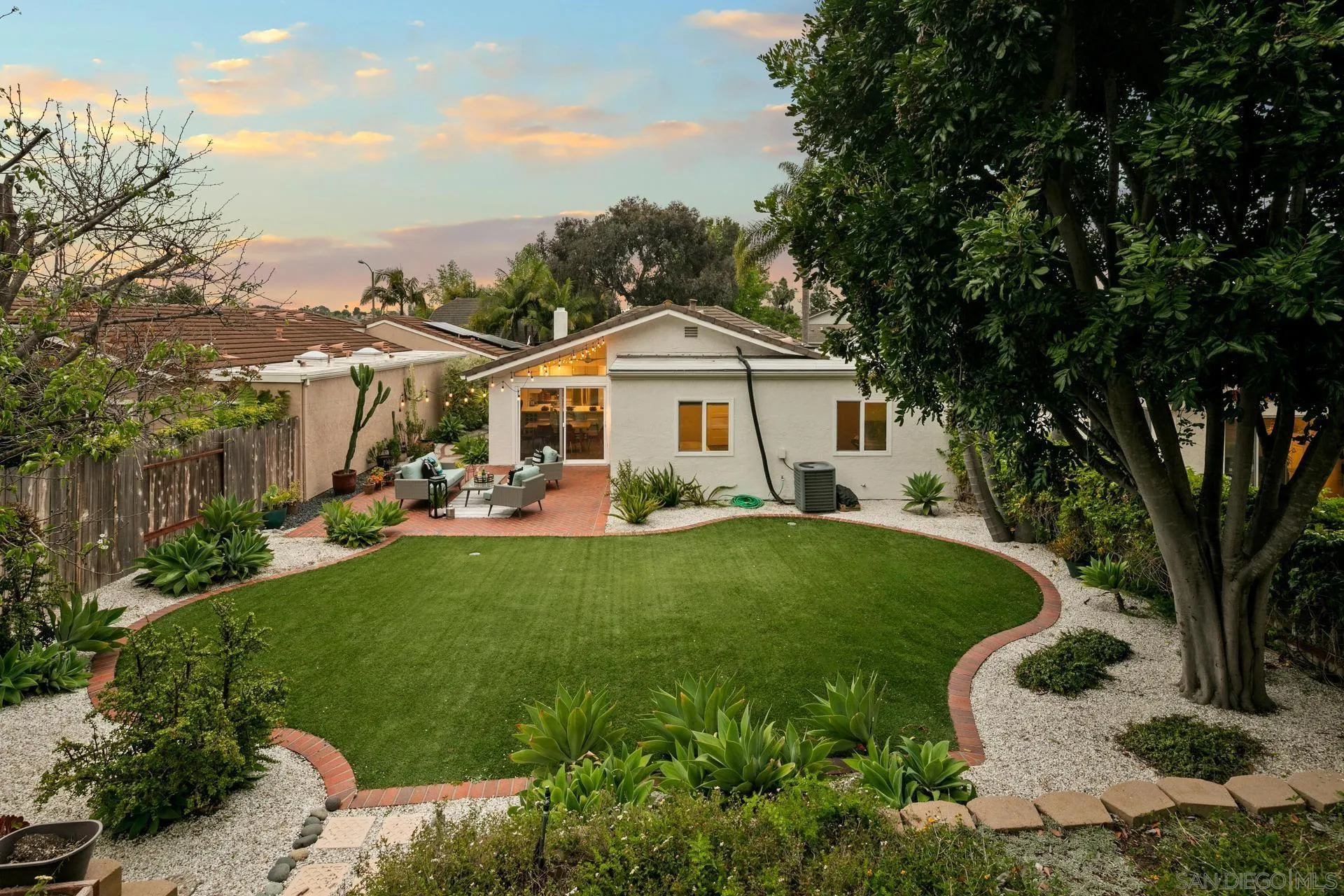 1736 Hill Top Lane Encinitas, CA 92024 - Photo 50 of 63 a front view of a house with a yard