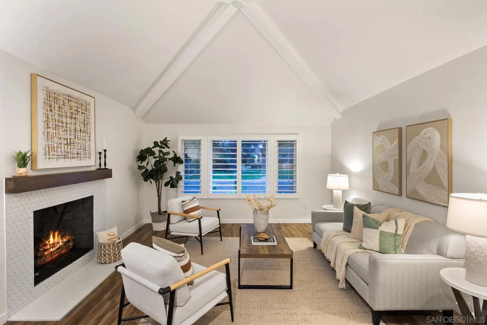 1736 Hill Top Lane Encinitas, CA 92024 - Photo 9 of 63 a living room with furniture and a fireplace