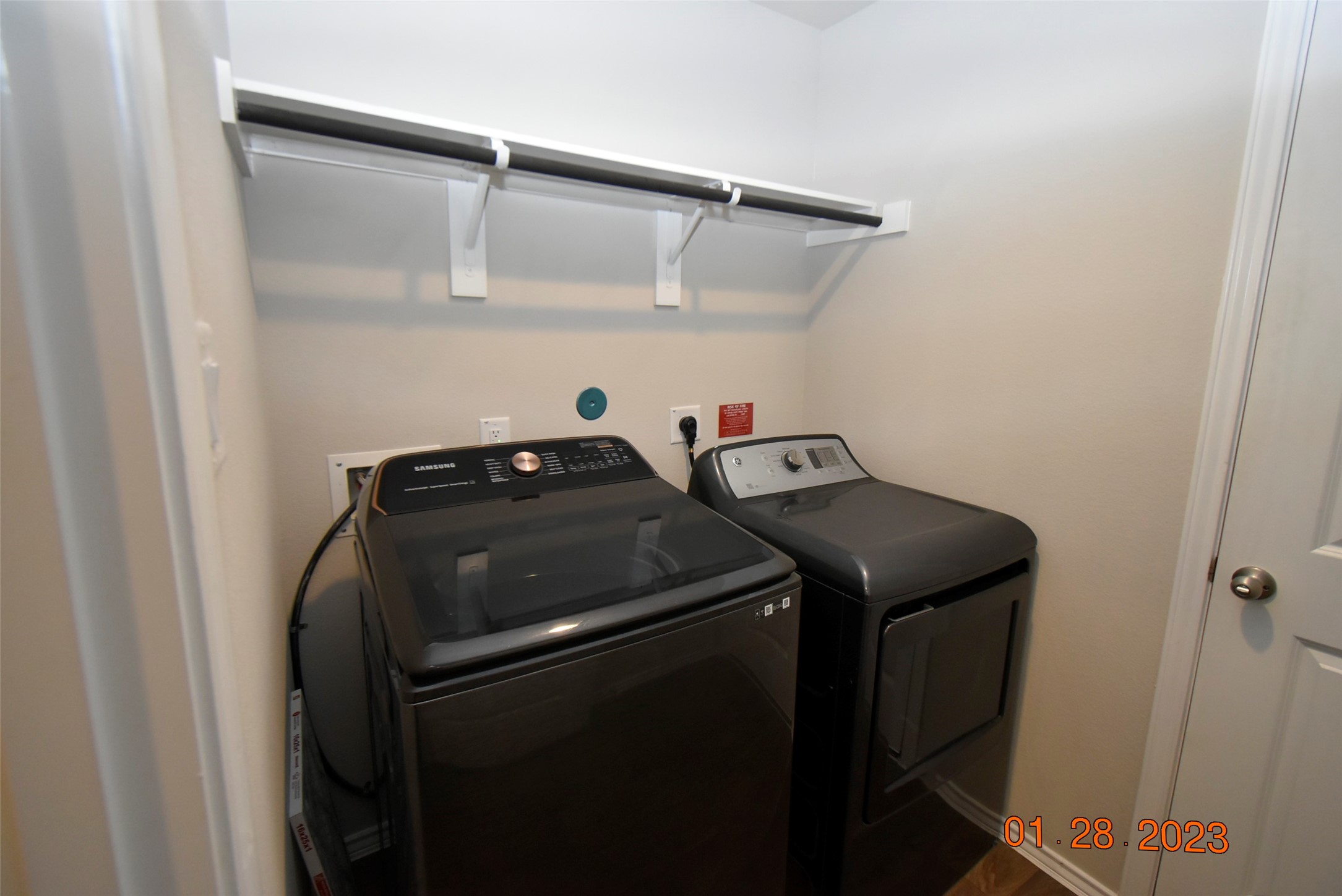 23710 Blodgett Peak Trail Spring, TX 77373 - Photo 12 of 17 a utility room with dryer and washer