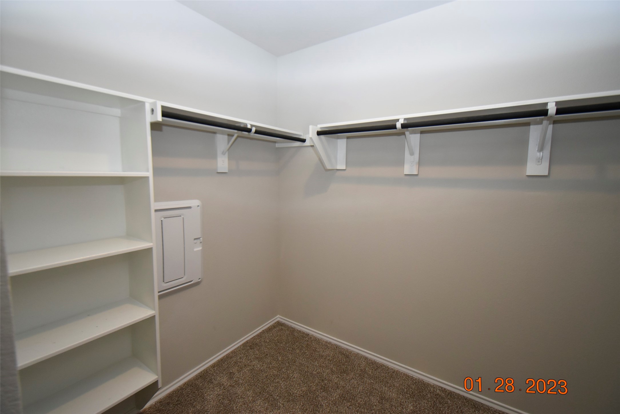 23710 Blodgett Peak Trail Spring, TX 77373 - Photo 7 of 17 a view of walk in closet with empty racks
