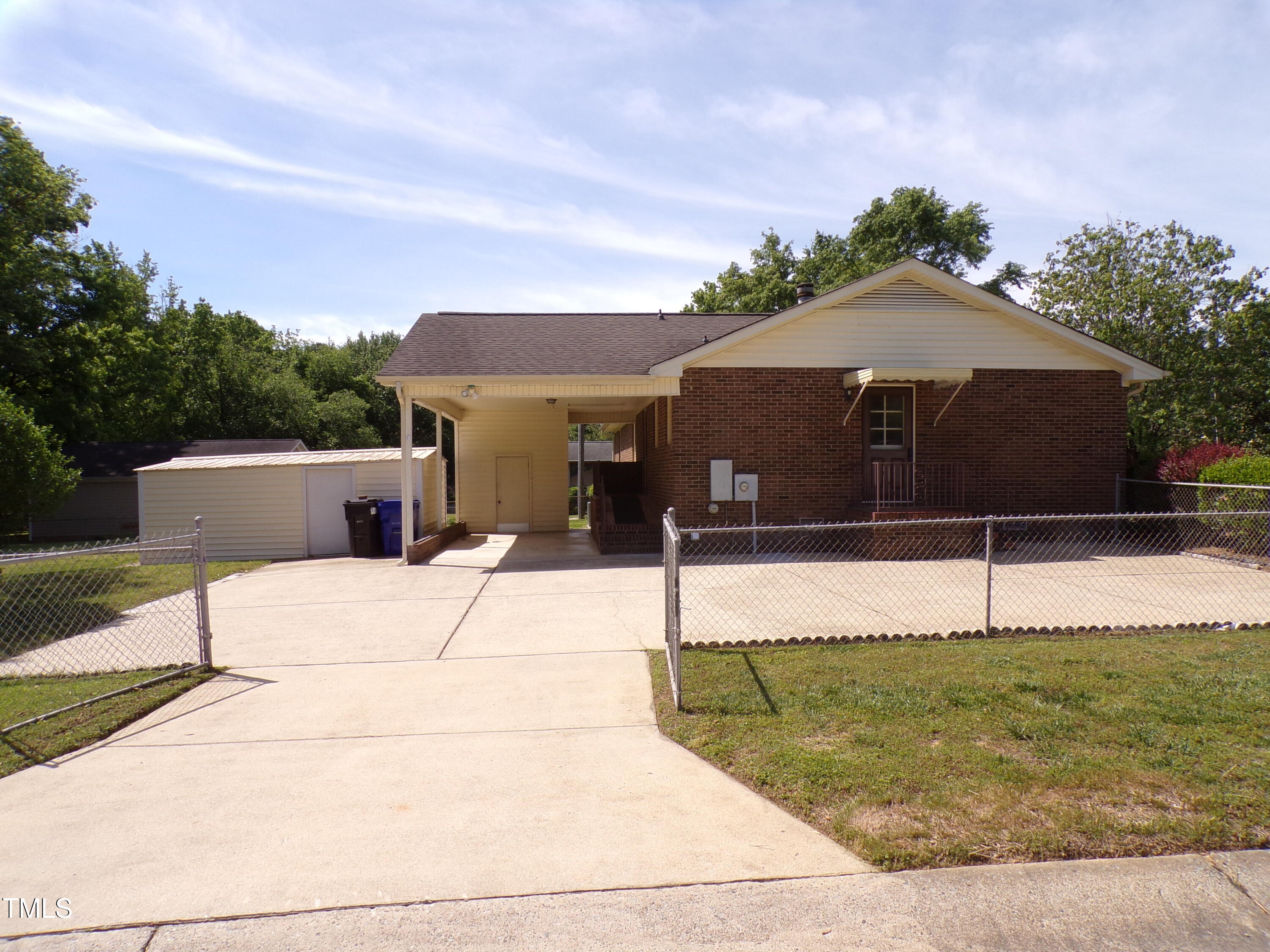 4908 Mandel Road Durham, NC 27712 - Photo 19 of 31 a house view with a garden space