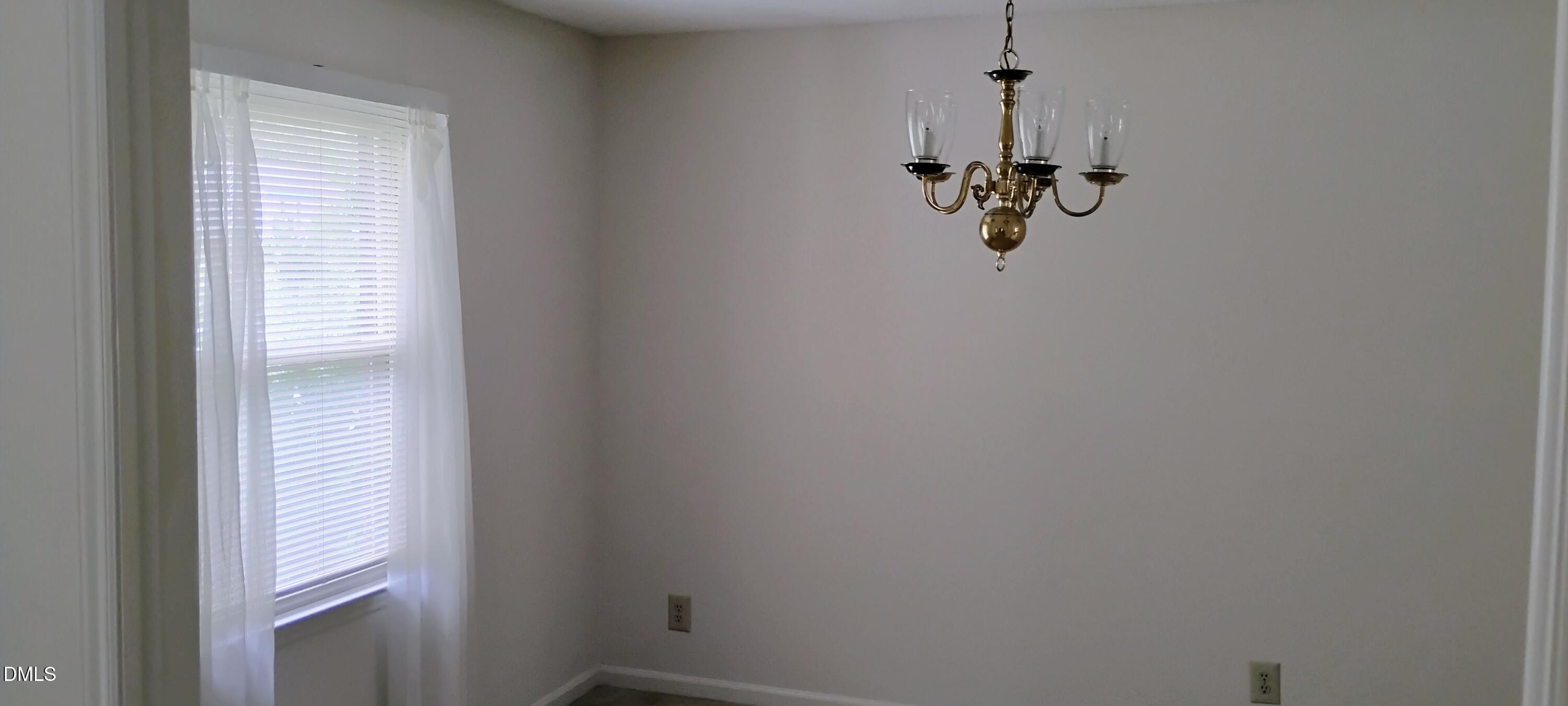 4908 Mandel Road Durham, NC 27712 - Photo 25 of 31 a view of a bathroom with a shower