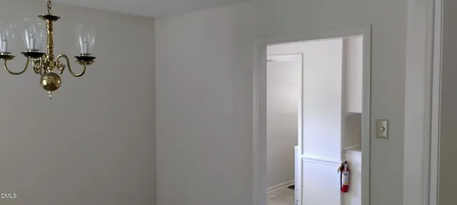 a bathroom with a shower a toilet and a sink