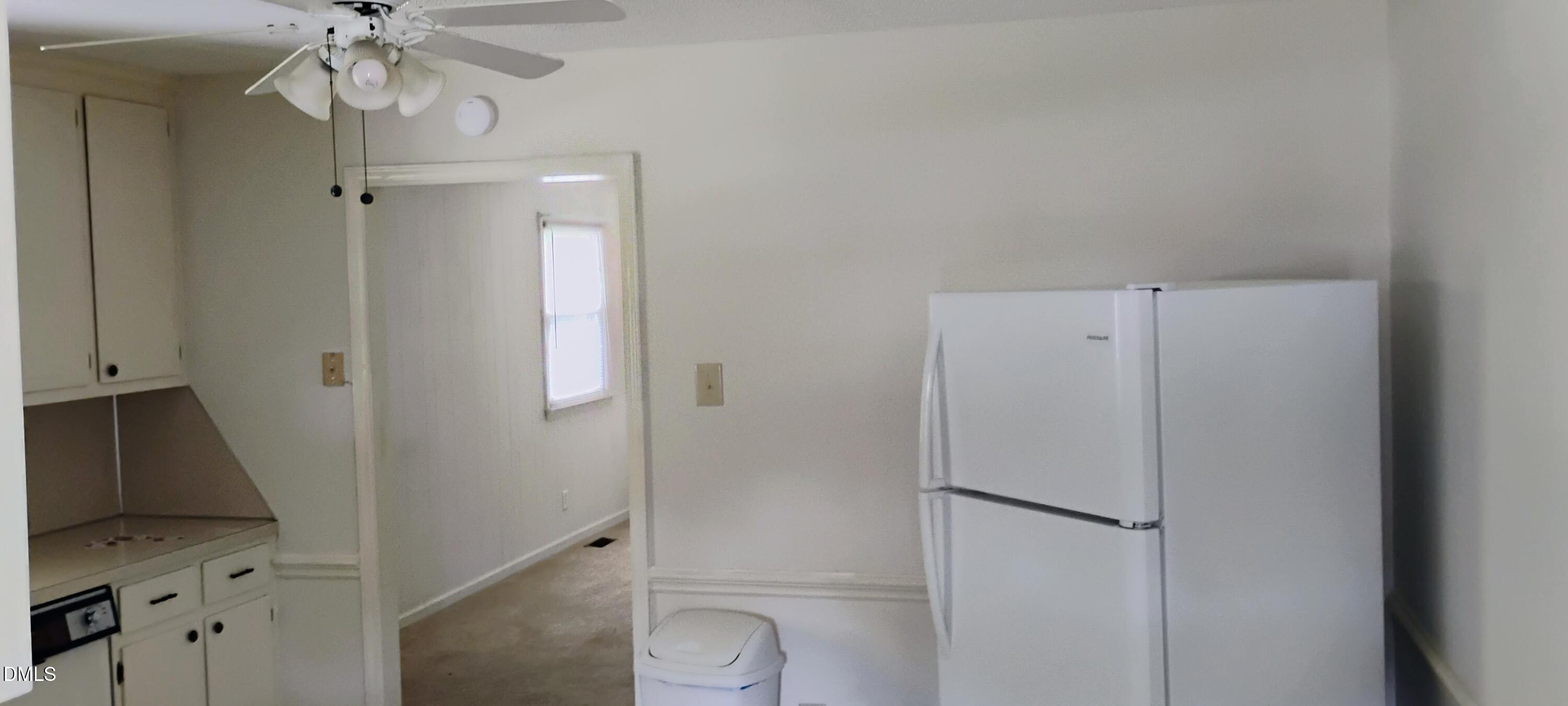 4908 Mandel Road Durham, NC 27712 - Photo 27 of 31 a bathroom with a shower a toilet and a sink