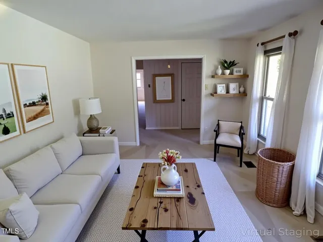 a living room with furniture and a couch