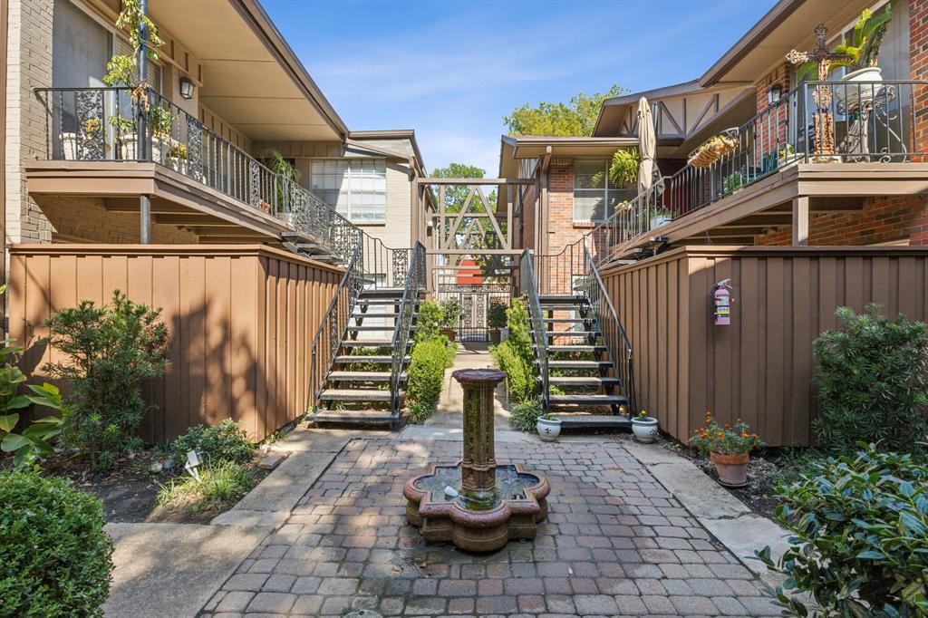 4207 Avondale Avenue, Unit 106 Dallas, TX 75219 - Photo 10 of 11 a house view with a garden