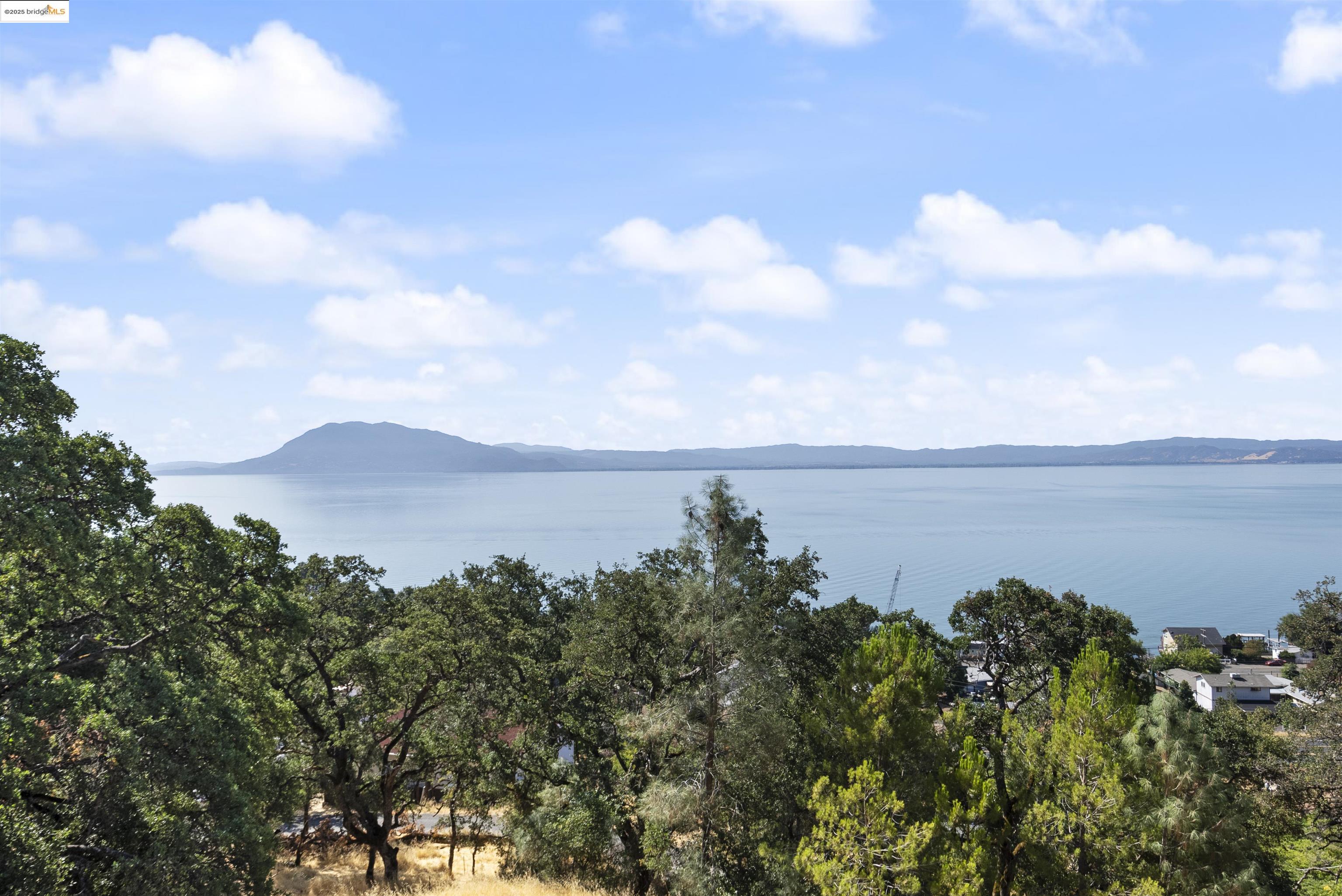 3215 Knob Street Nice, CA 95464 - Photo 34 of 35 a view of a lake and mountain in the back