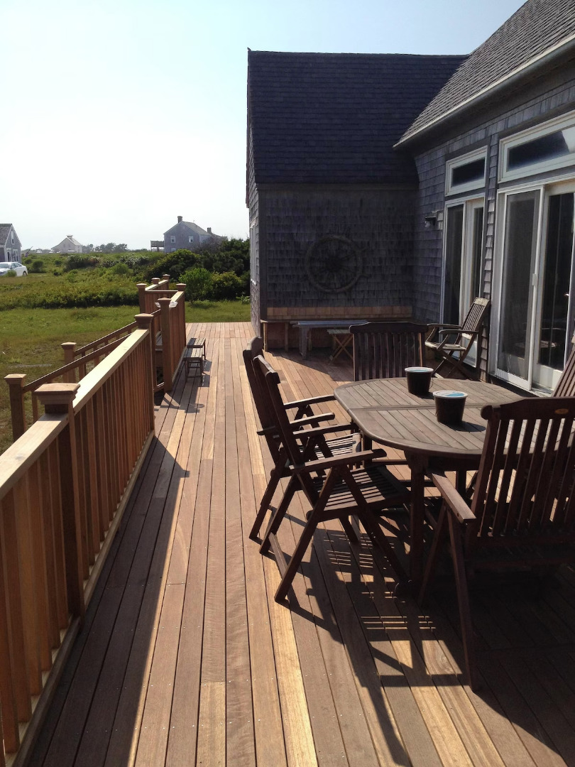 48 Madequecham Valley Road Nantucket, MA 02554 - Photo 11 of 20 a view of a balcony with furniture
