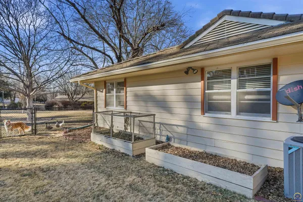 $335,000 | 307 Southwest Woodbury Lane, Topeka, KS 66606