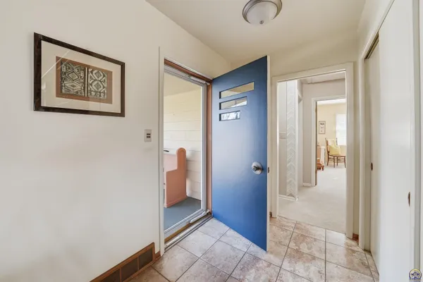 $335,000 | 307 Southwest Woodbury Lane, Topeka, KS 66606