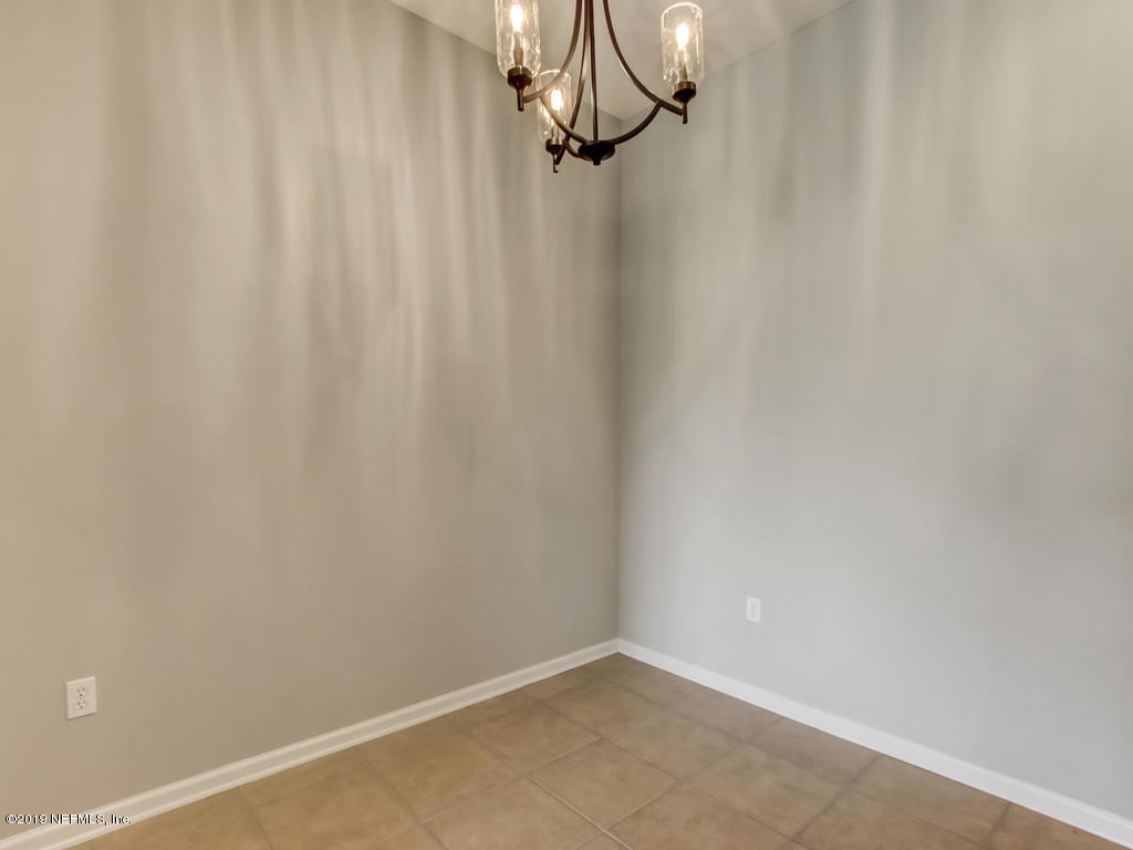 648 Porta Rosa Circle St. Augustine, FL 32092 - Photo 22 of 59 a view of a room with racks on the wall