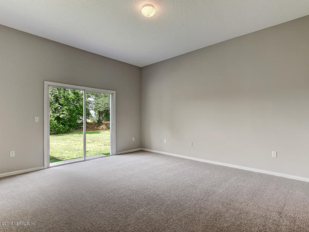 648 Porta Rosa Circle St. Augustine, FL 32092 - Photo 28 of 59 a view of an empty room with a window