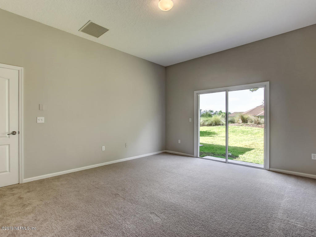 648 Porta Rosa Circle St. Augustine, FL 32092 - Photo 29 of 59 a view of an empty room with a window