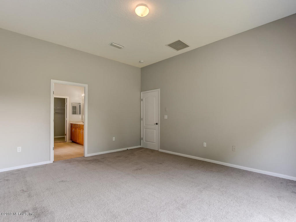 648 Porta Rosa Circle St. Augustine, FL 32092 - Photo 31 of 59 a view of an empty room with a window