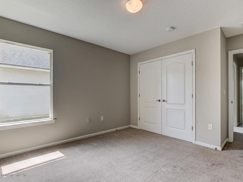 648 Porta Rosa Circle St. Augustine, FL 32092 - Photo 40 of 59 a view of an empty room with a window