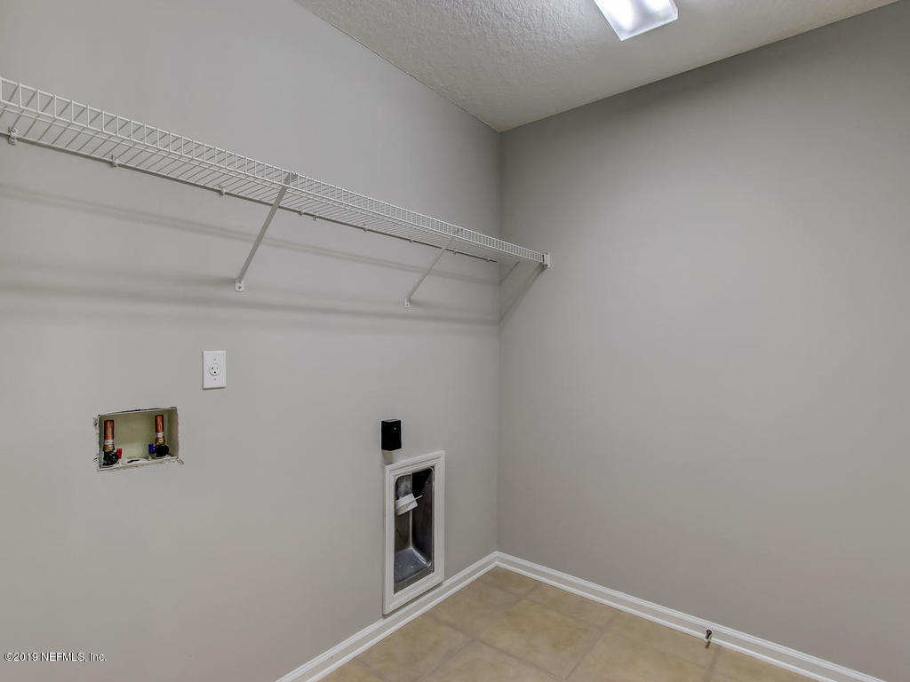 648 Porta Rosa Circle St. Augustine, FL 32092 - Photo 41 of 59 a view of a hallway with closet