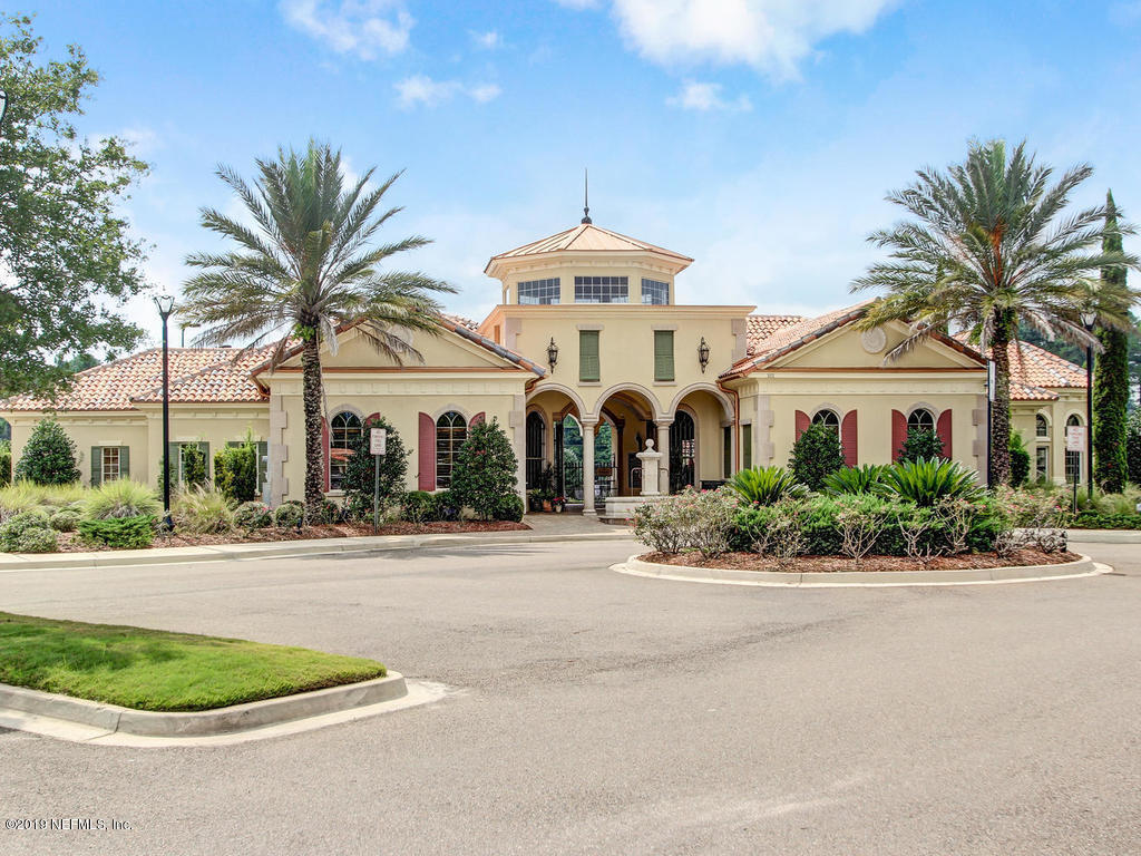 648 Porta Rosa Circle St. Augustine, FL 32092 - Photo 54 of 59 front view of a house with a garden