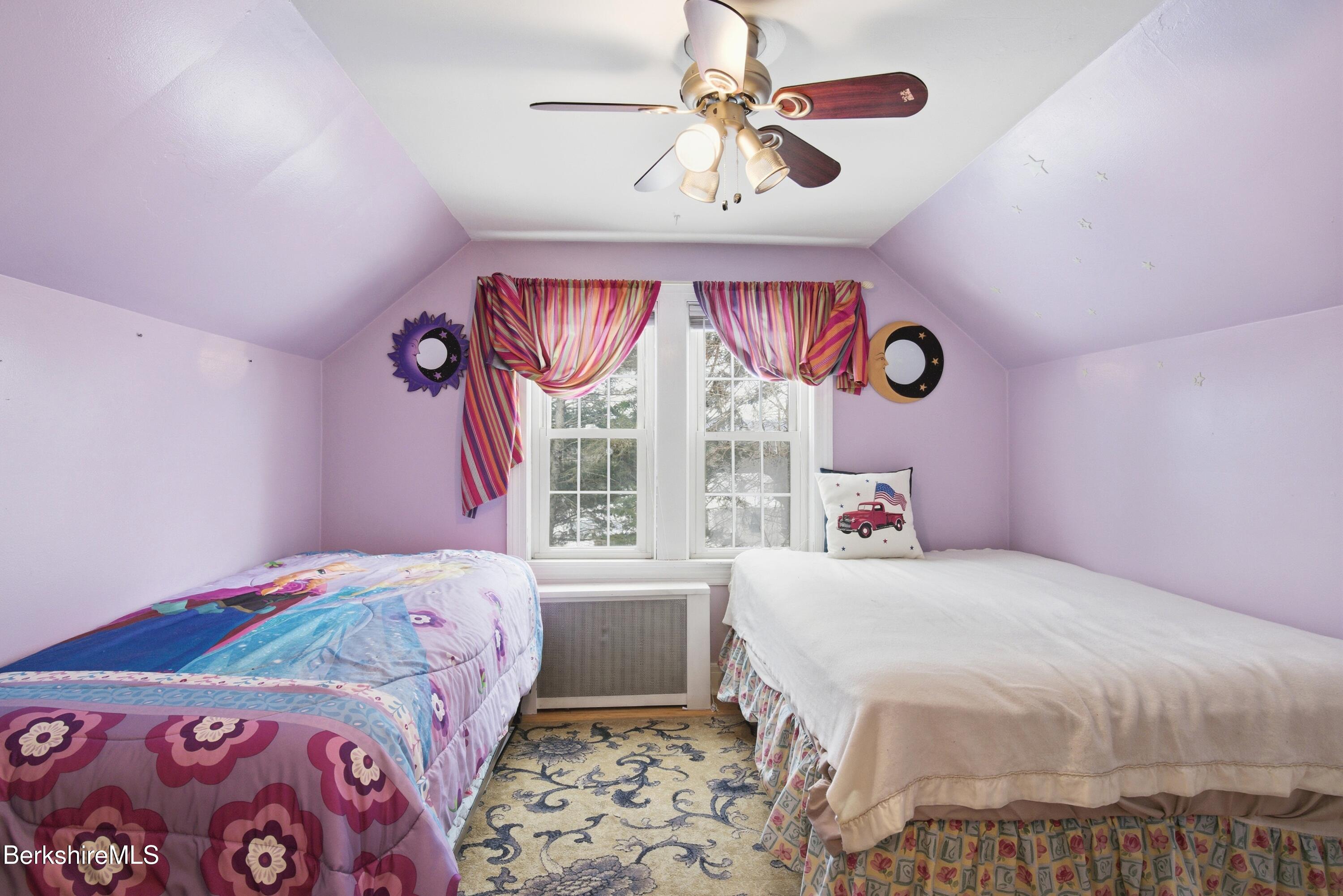 53 Edison Avenue Pittsfield, MA 01201 - Photo 18 of 45 a bedroom with a bed and a window