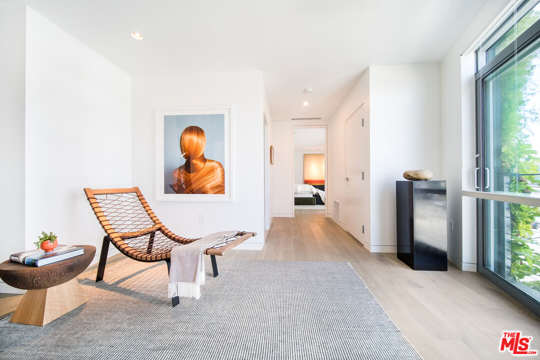 8600 Wilshire Boulevard, Unit GF15 Beverly Hills, CA 90211 - Photo 22 of 26 a living room with furniture