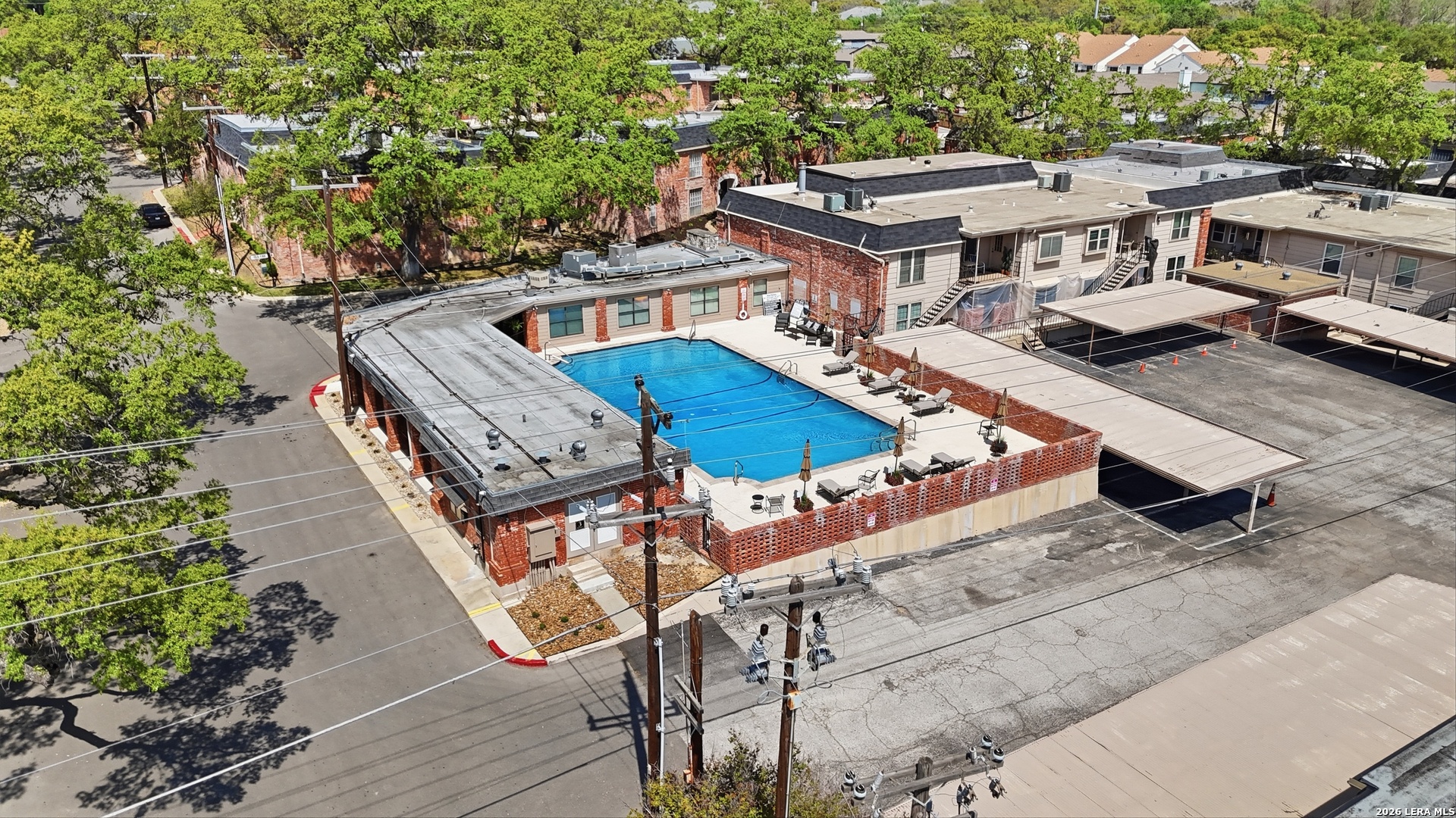 7500 Callaghan Road, Unit 140 San Antonio, TX 78229 - Photo 36 of 42 an aerial view of a house with roof deck and outdoor seating