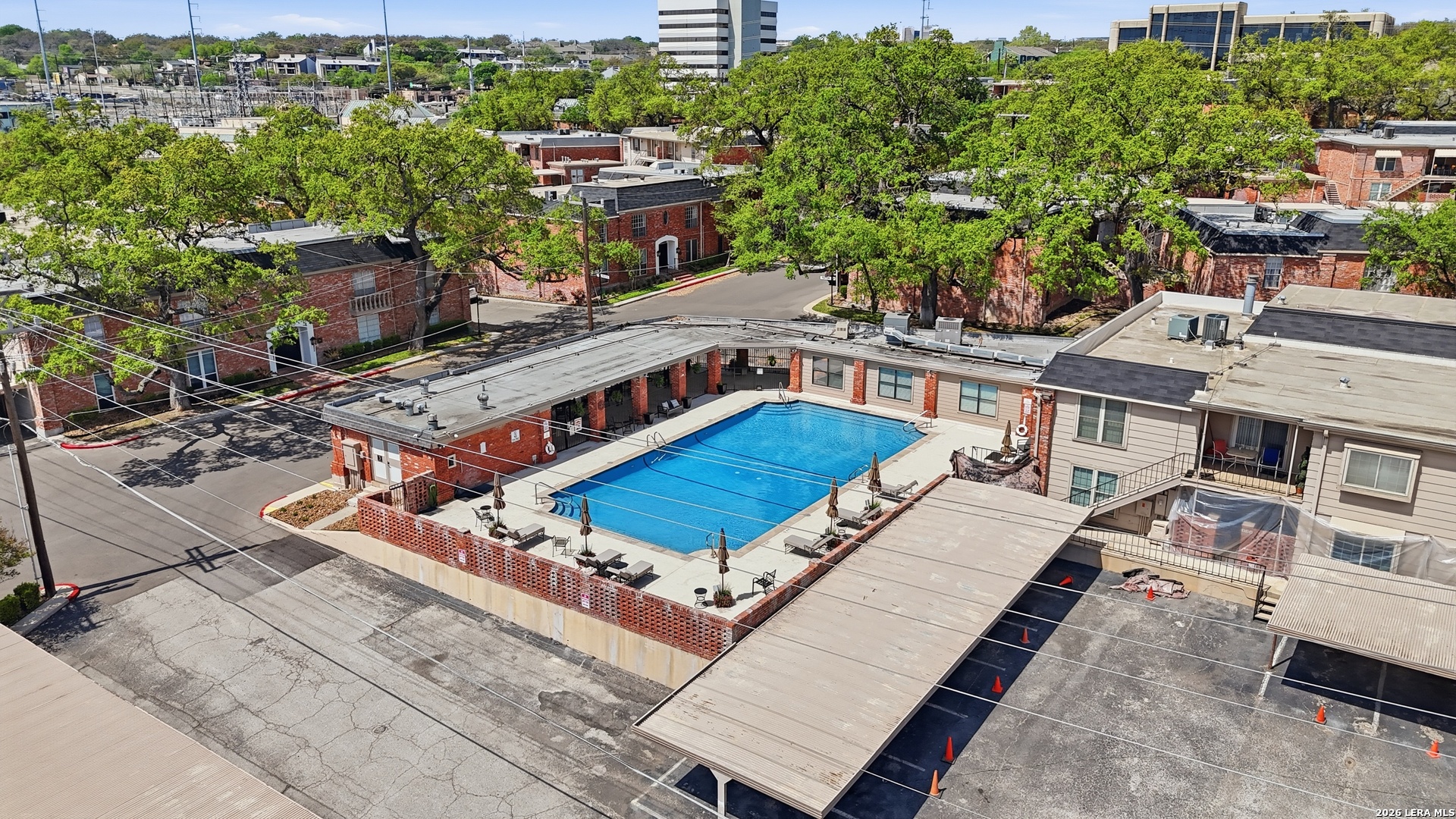 7500 Callaghan Road, Unit 140 San Antonio, TX 78229 - Photo 37 of 42 an aerial view of a house with a garden