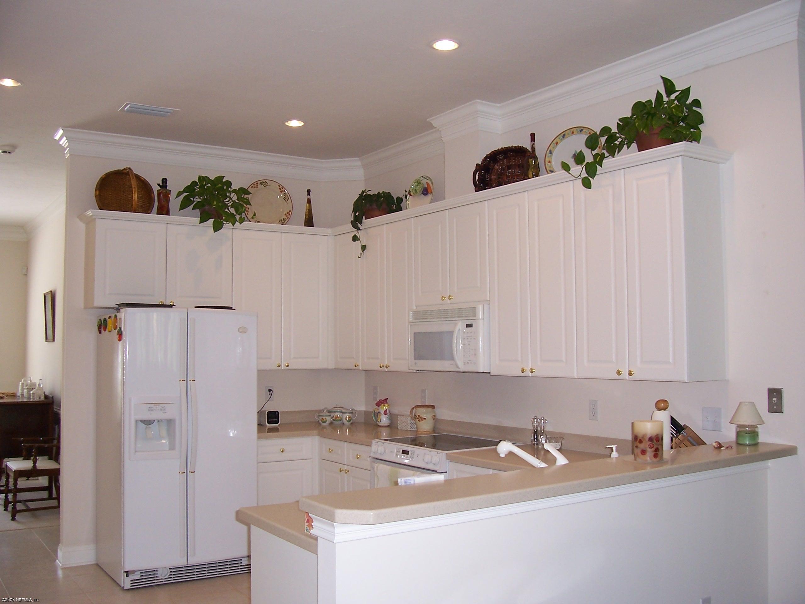 508 Fresh Pond Road Ponte Vedra Beach, FL 32082 - Photo 2 of 7 a bathroom with a sink a mirror and a shower
